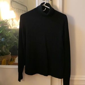 Black Cashmere J Crew turtleneck. Lightly worn.